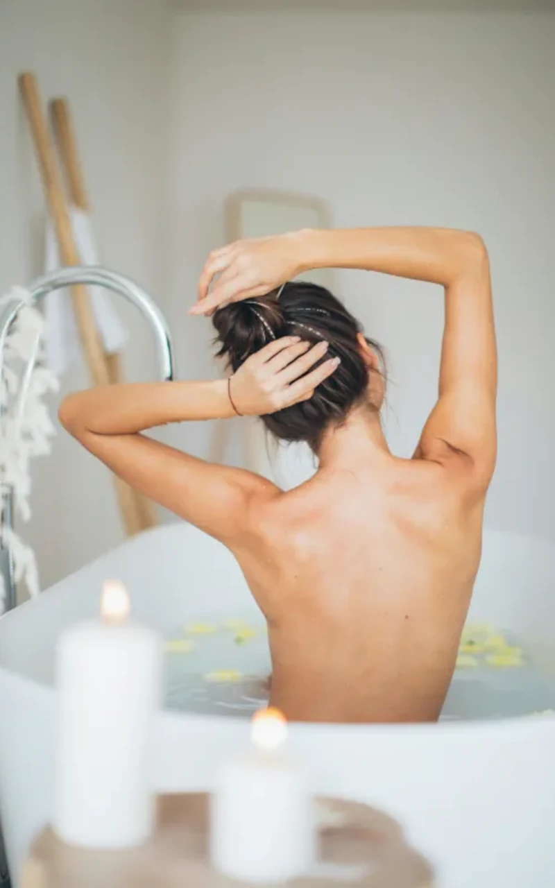 Relaxing moment in a hot bath with candles